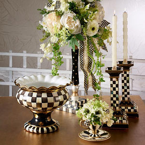 https://www.janeleslieco.com/products/mackenzie-childs-glow-check-dinner-candles-ivory-set-of-2