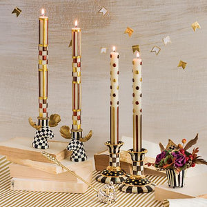 https://www.janeleslieco.com/products/Mackenzie-Childs Glow-check-stripe-dinner-candles-autumn-set-of-2