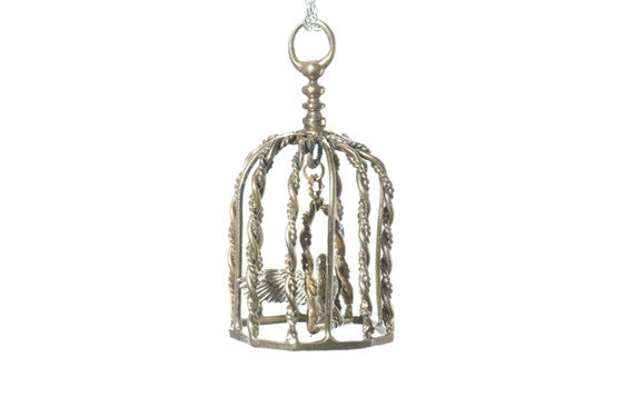https://www.janeleslieco.com/products/digby-iona-caged-sparrow-on-swing
