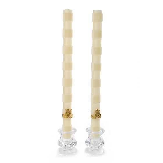 https://www.janeleslieco.com/products/mackenzie-childs-glow-check-dinner-candles-ivory-set-of-2