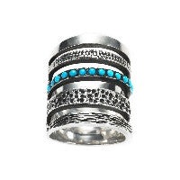 https://www.janeleslieco.com/products/pamela-love-single-cage-ring-with-turquoise